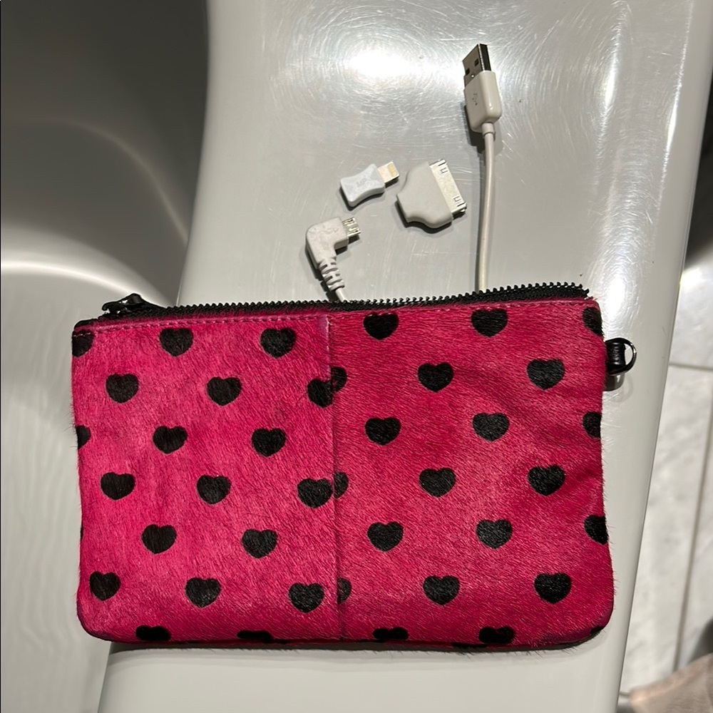 Phone charger/wallet/bag.